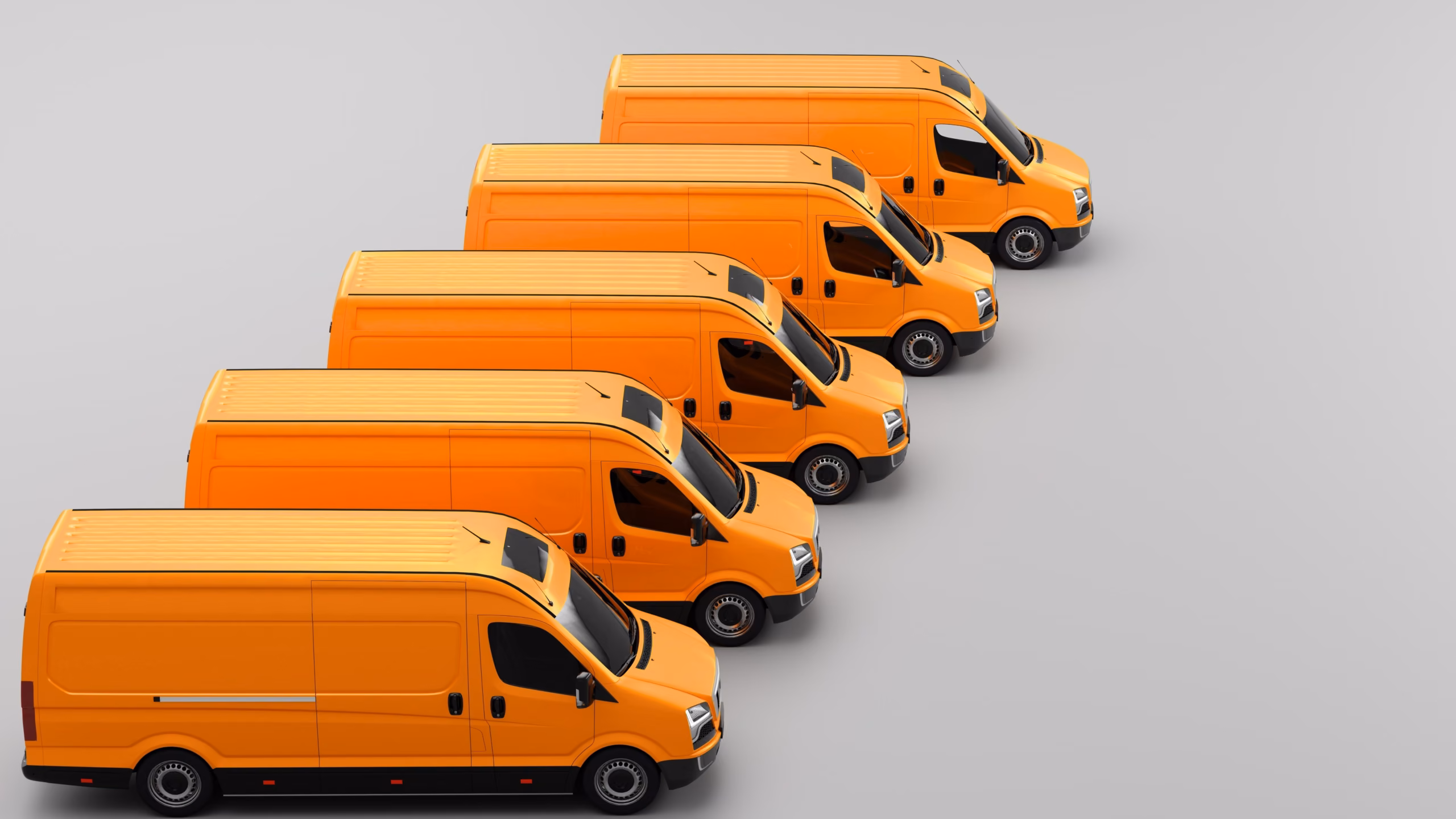 Five identical orange commercial vans parked in a diagonal row against a plain grey background.