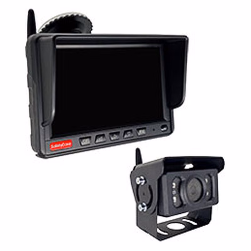 A wireless reversing camera with infrared lights and a handheld in-car monitor with a black screen.